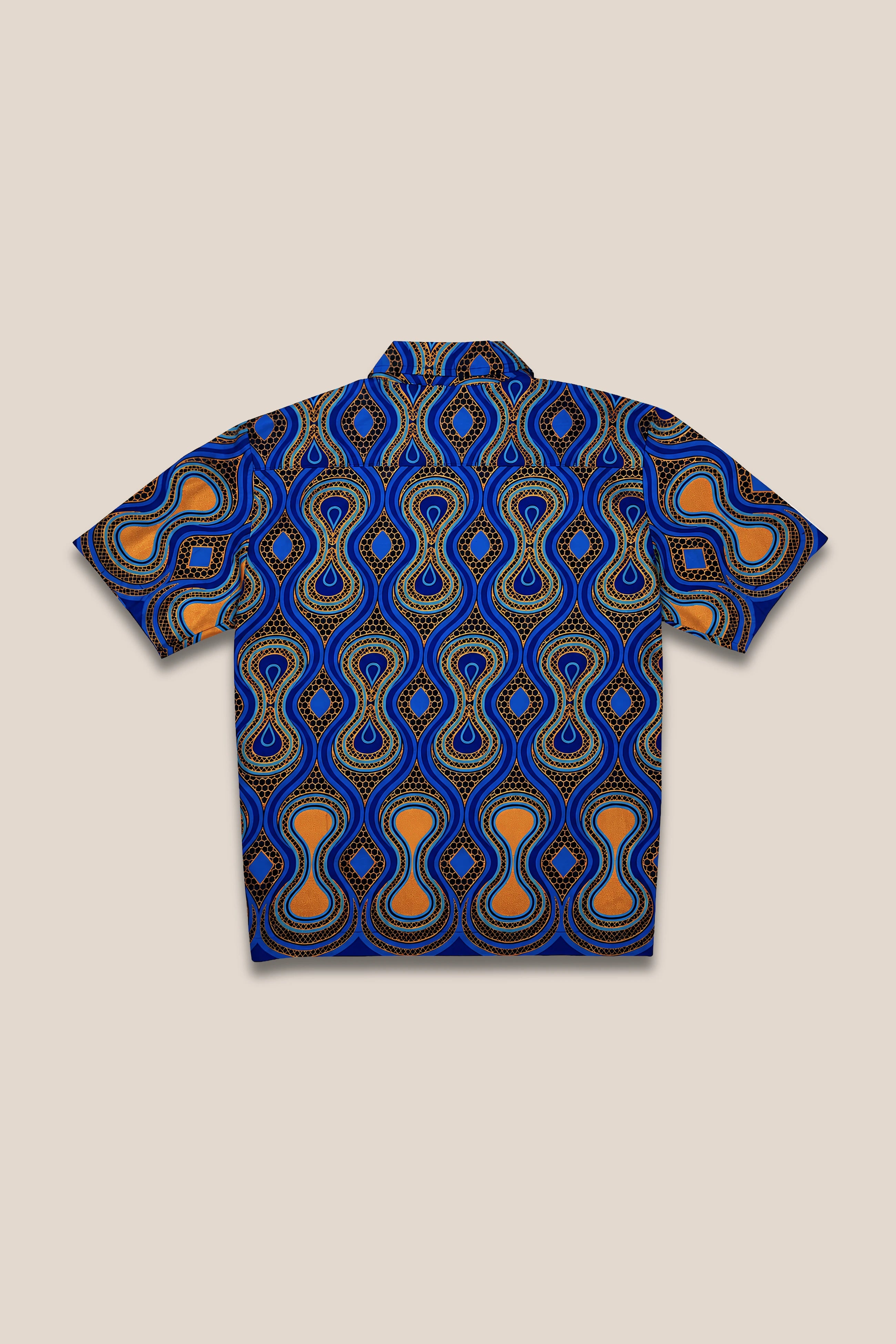 Chemise droite boutonnée, imprimé bleu motif orange paillette