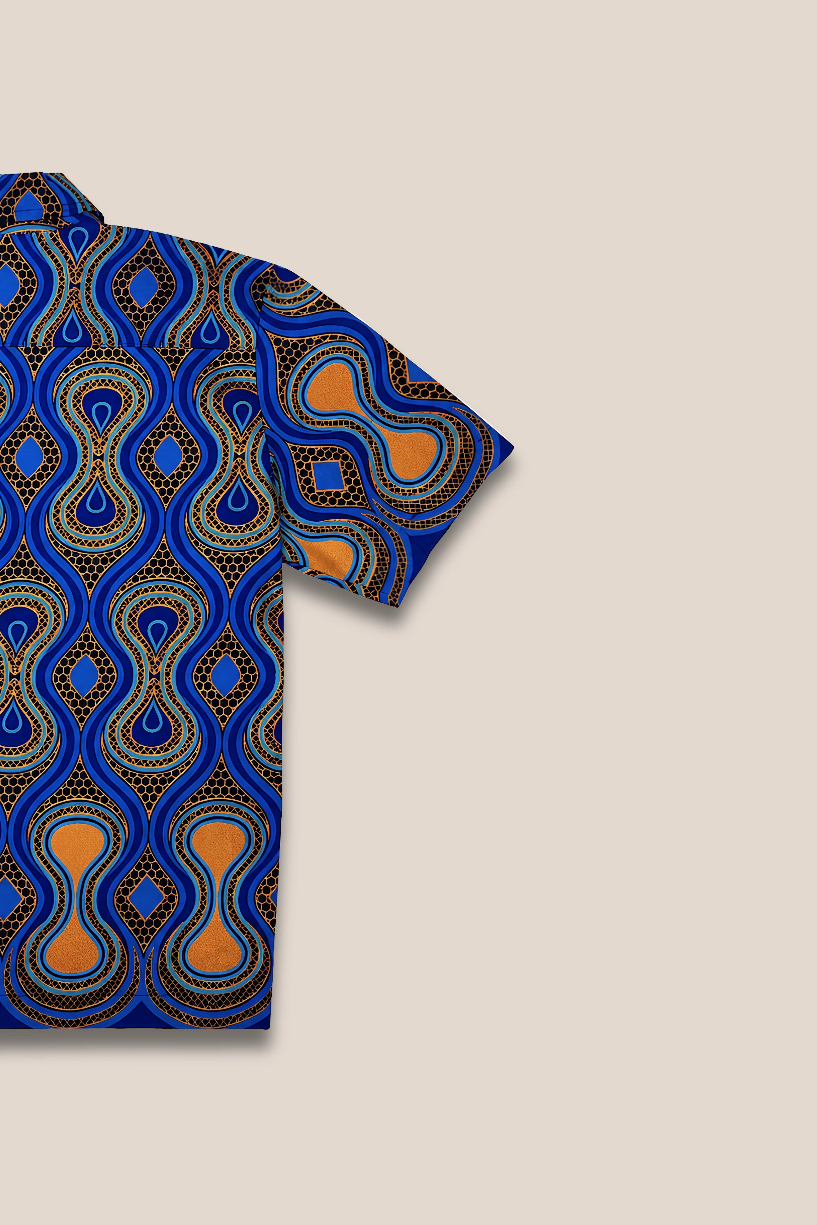 Chemise droite boutonnée, imprimé bleu motif orange paillette